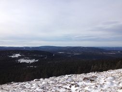 white snow on the slopes of the mountain