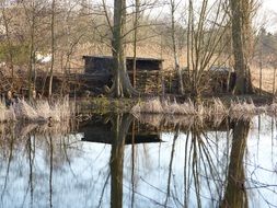 old wooden house near the lake