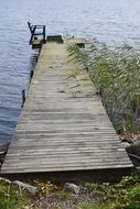 old wooden pier on the lake