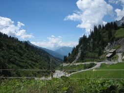 strained wires along the alpine mountains