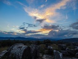 blue sunset over a valley in greece