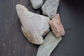 nature grey stones on wooden board