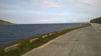 empty asphalt road along seaside