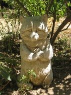 Racoon sculpture in the garden