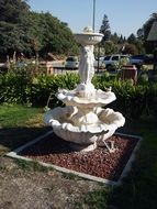 white garden fountain