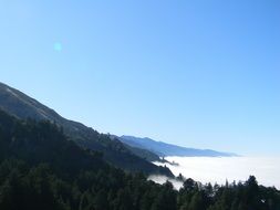 foggy mountain lake at morning