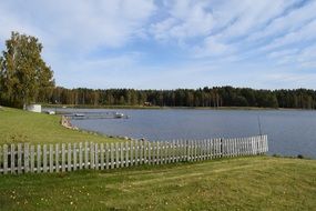 wooden fence near a river in western Utviken