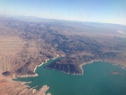 view of a mountain lake from an airplane