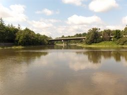 distant view of the bridge across the river Thames among beautiful nature