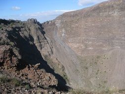 crater of a volcano on a sunny day