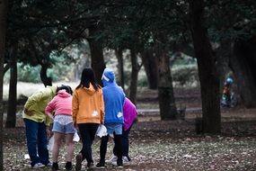 colorful teens in summer park playing