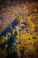 panorama of forested rocks in autumn colors