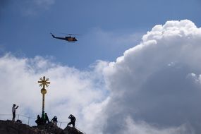 helicopter landing under blue sky
