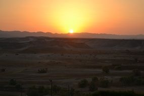 Landscape picture of the desert at the sunset