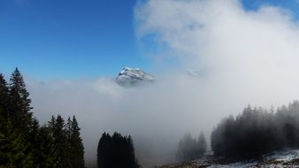 mountain in a thick cloud