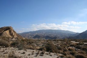 A desert landscape against a background of mountains in Andalusia