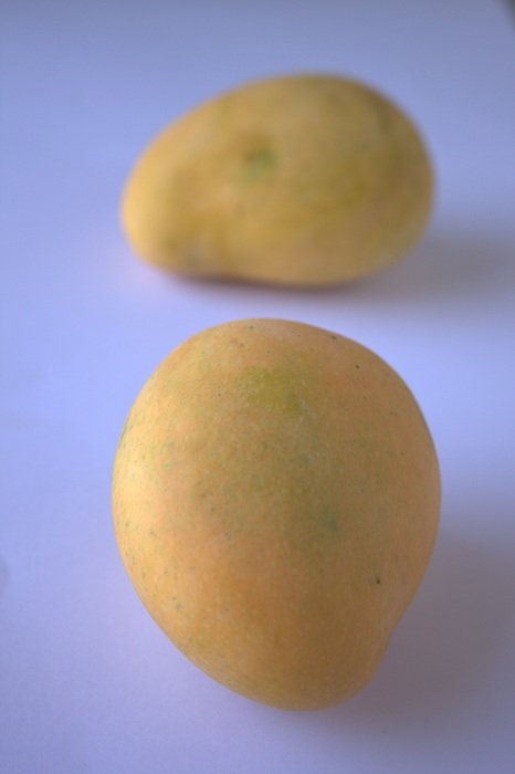yellow mango on the table