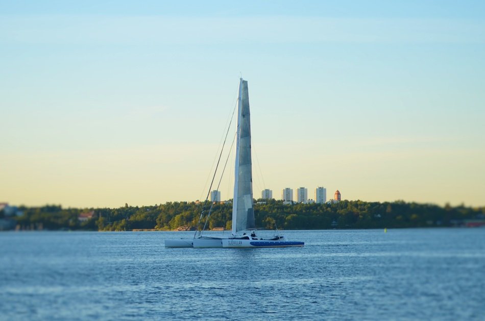sailing on the background of the city hill