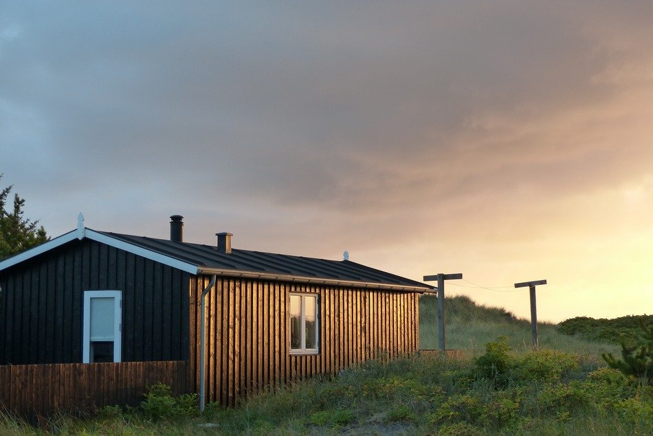 wooden house at dusk, denmark, laesoe