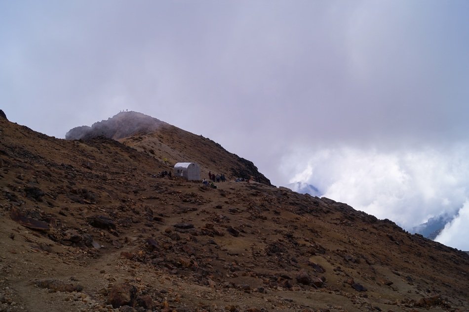 shelter in alpine mountain under the sky