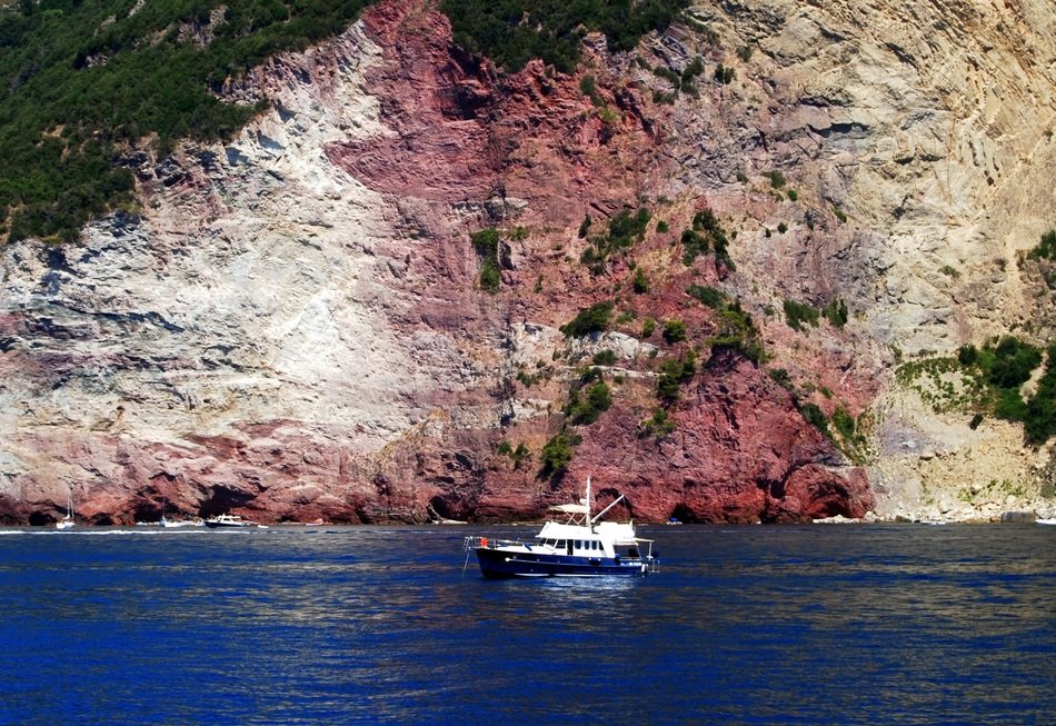 boat near the cliff in italy