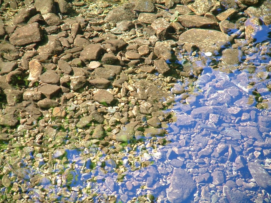reflection of stones in water