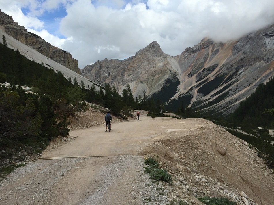 landscape of People on the road against the backdrop of picturesque dolomites
