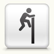 A white button if a business man climbing wall
