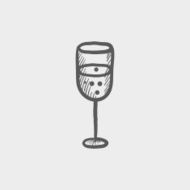 Glass of champagne sketch icon