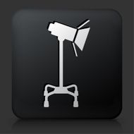 Black Square Button with Photography Lighting Equipment