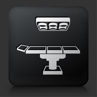 Black Square Button with Operating Table Icon