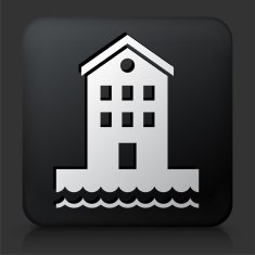 Black Square Button with Building near Water