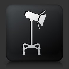 Black Square Button with Photography Lighting Equipment