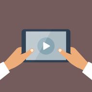 Human hand holds tablet pc with opened media player