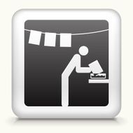 Square Button with Person Developing Photos in the Darkroom