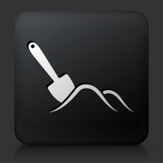 Black Square Button with Shovel & Sand Icon