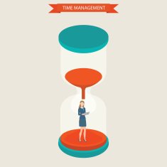 Business women holding laptop standing at hourglass N2