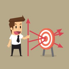 businessman throwing arrows at the target precisely goal of