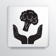 Square Icon With Two Hands Cupping a Stalk of Broccoli