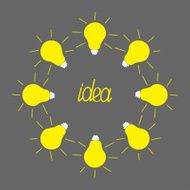 Yellow light bulb round frame on grey background Idea concept