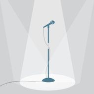 The microphone on the stage under spotlights