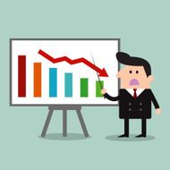 businessman Manager Pointing To A Decrease Chart On Board