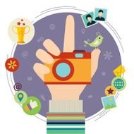 Human hand with photo camera
