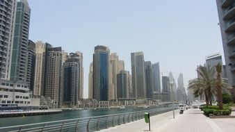 skyscrapers by the river in dubai