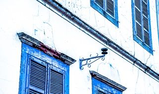 facade of a mansion with windows