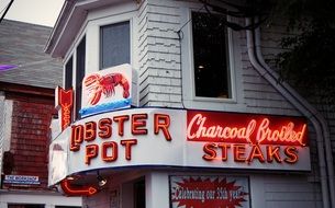 illuminated neon street signs of restaurant