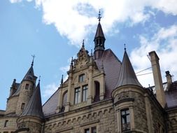 towers of Scrotum Castle at sky, poland, Moszna
