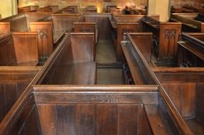 wooden benches in a church