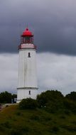 Dornbusch Lighthouse at cloudy sky, germany, hiddensee