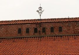 red clay tile roof of aged building, sweden, kristianstad